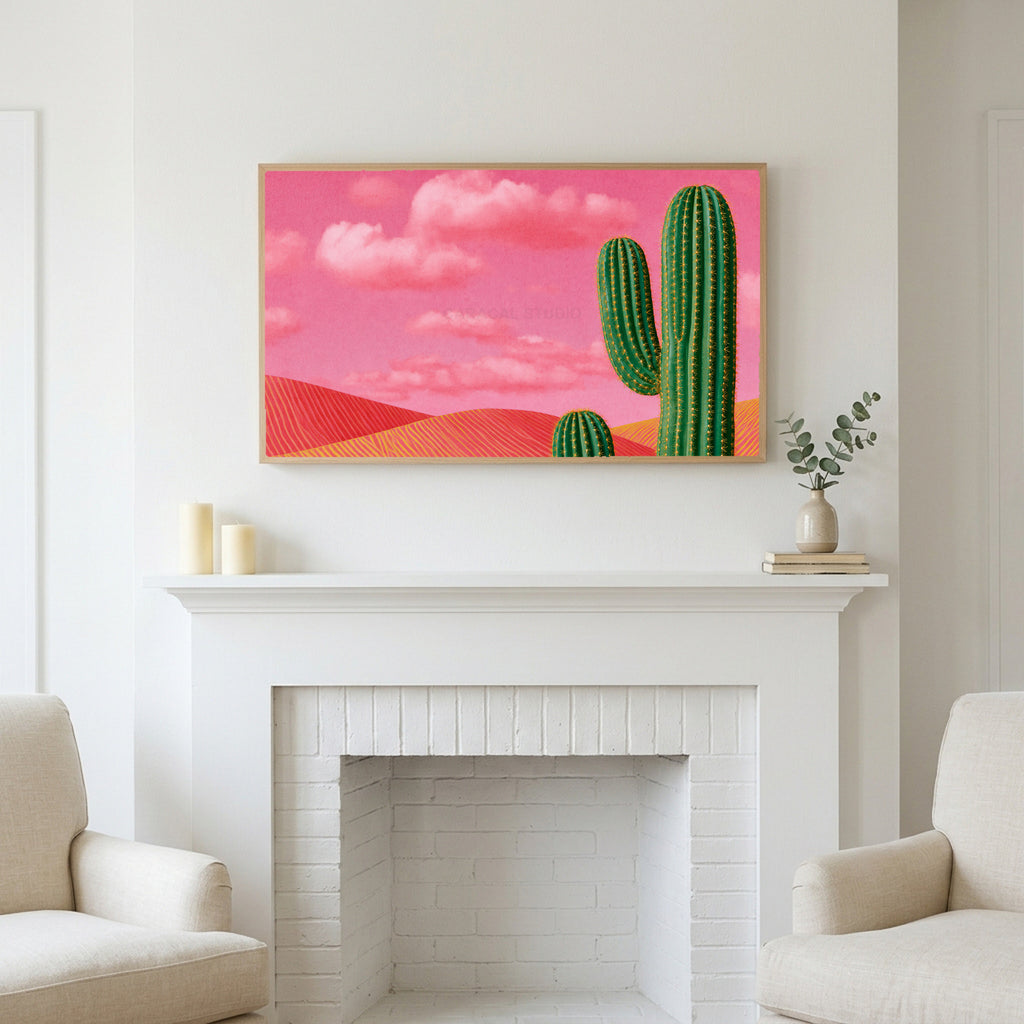 Saguaro cactus art above a white fireplace with candles and eucalyptus on the mantel