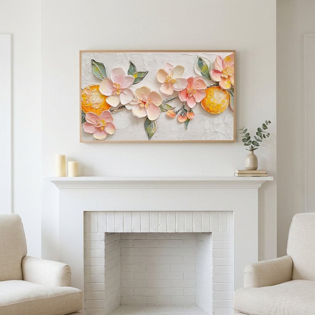 Frame TV art above a white fireplace with candles and eucalyptus on the mantel