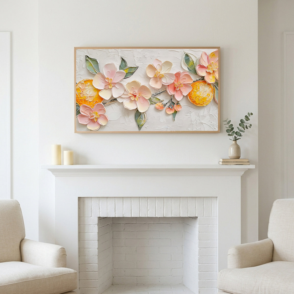 Frame TV art above a white fireplace with candles and eucalyptus on the mantel