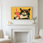 Funny cat in sunglasses art above a white fireplace with candles and eucalyptus on the mantel