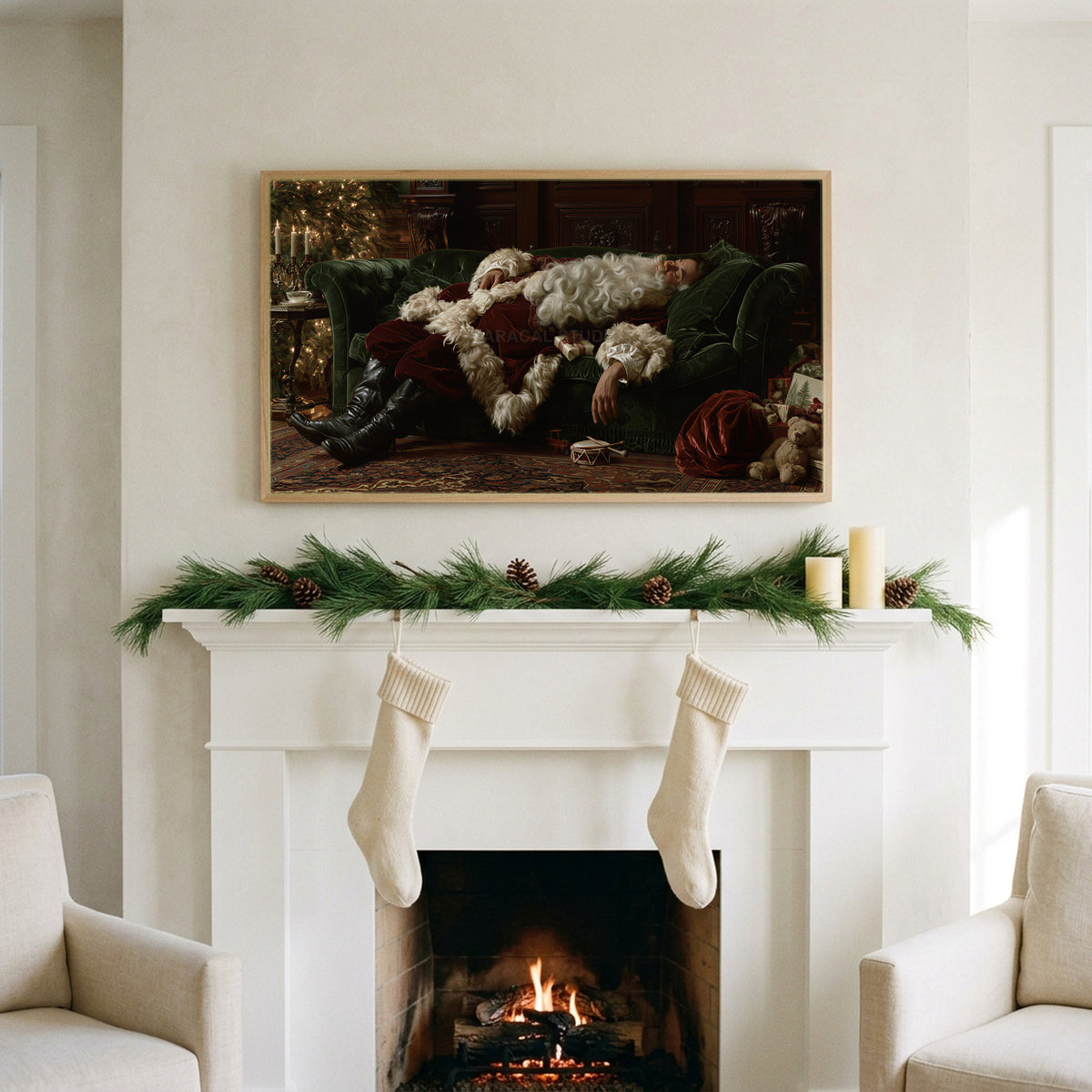 Sleeping Santa art on a TV above a white fireplace with a pine garland and cream stockings