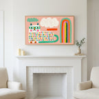 Rainbow cat art above a white fireplace with candles and eucalyptus on the mantel