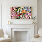 Flower bouquets art above a white fireplace with candles and eucalyptus on the mantel