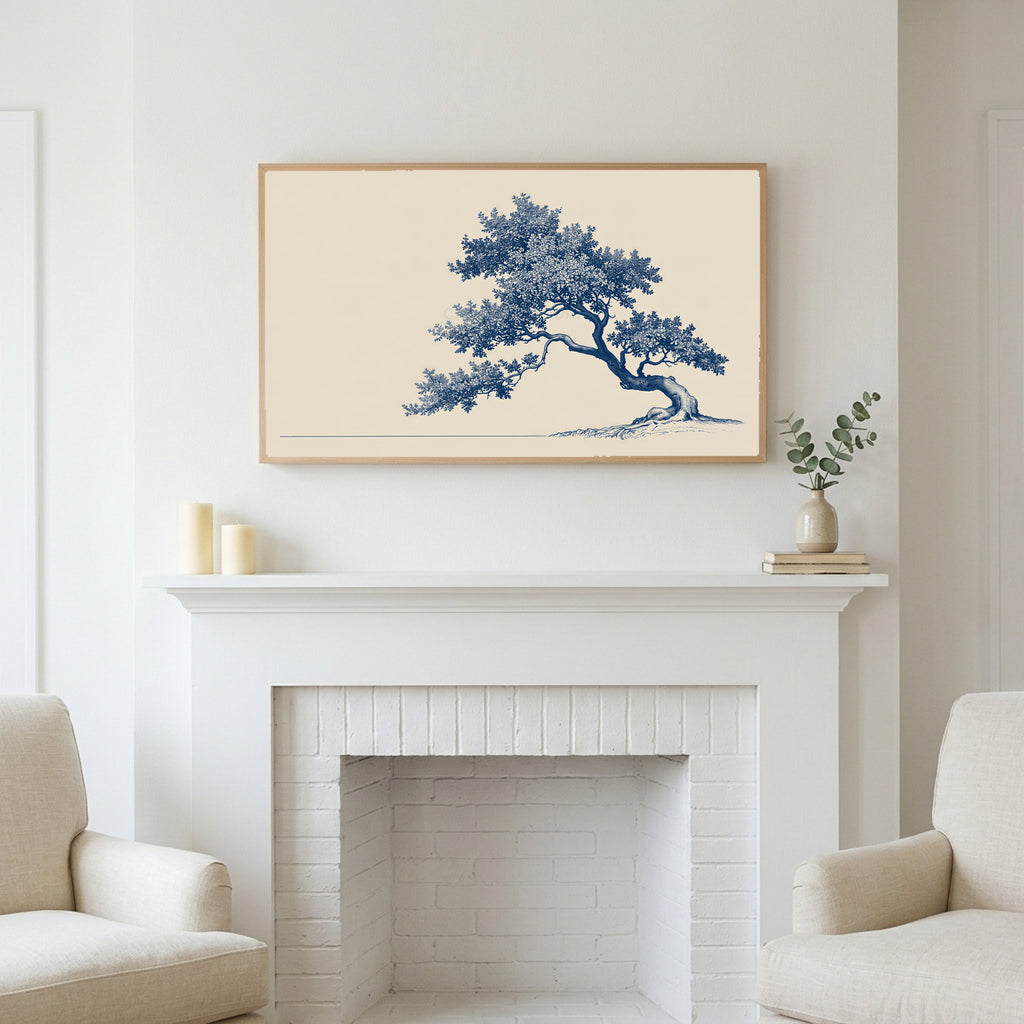 Blue ink tree art above a white fireplace with candles and eucalyptus on the mantel