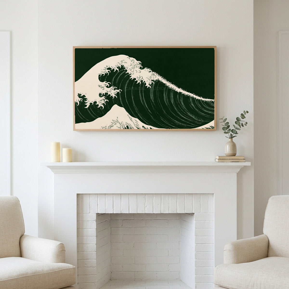 Frame TV art above a white fireplace with candles and eucalyptus on the mantel