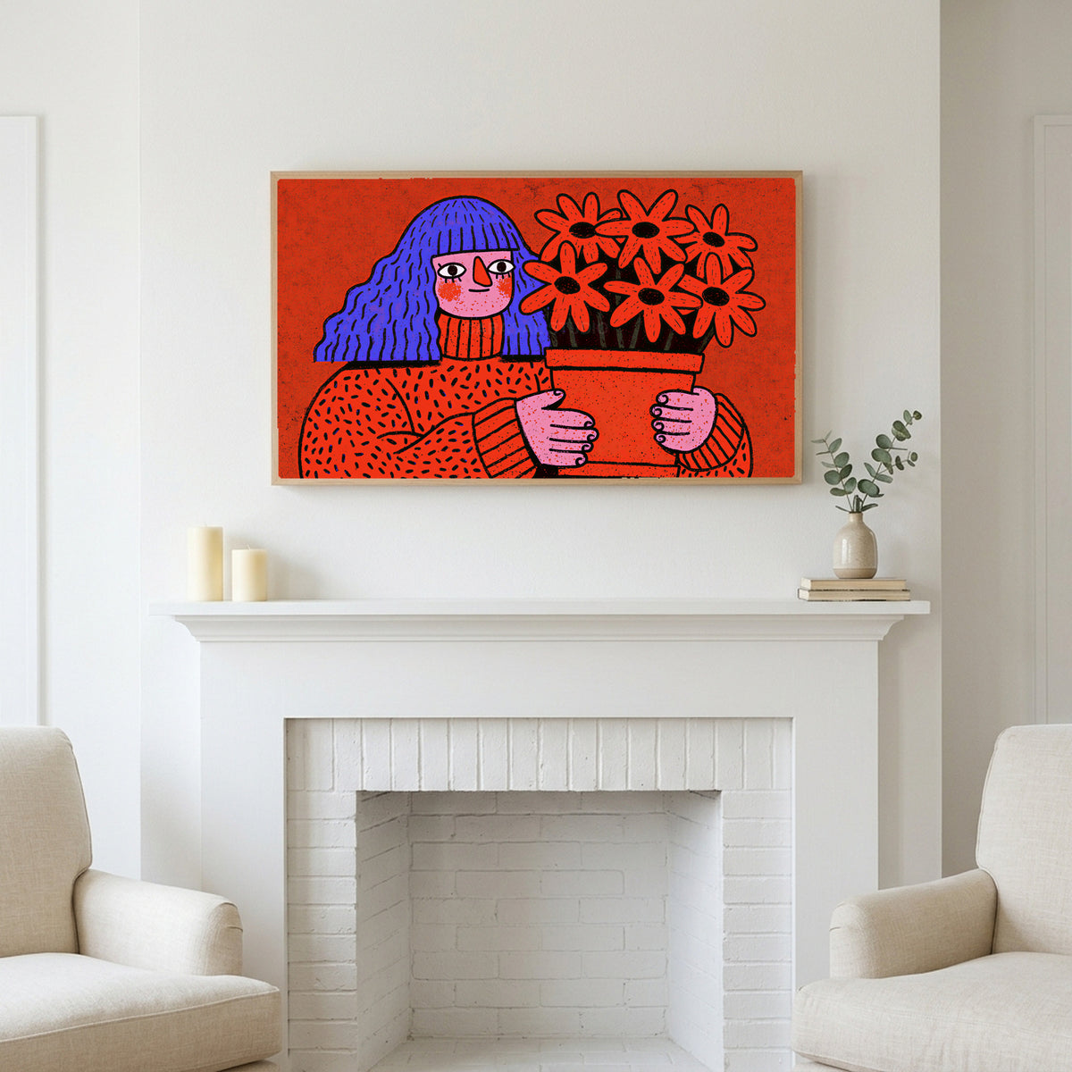 Blue hair portrait art above a white fireplace with candles and eucalyptus on the mantel