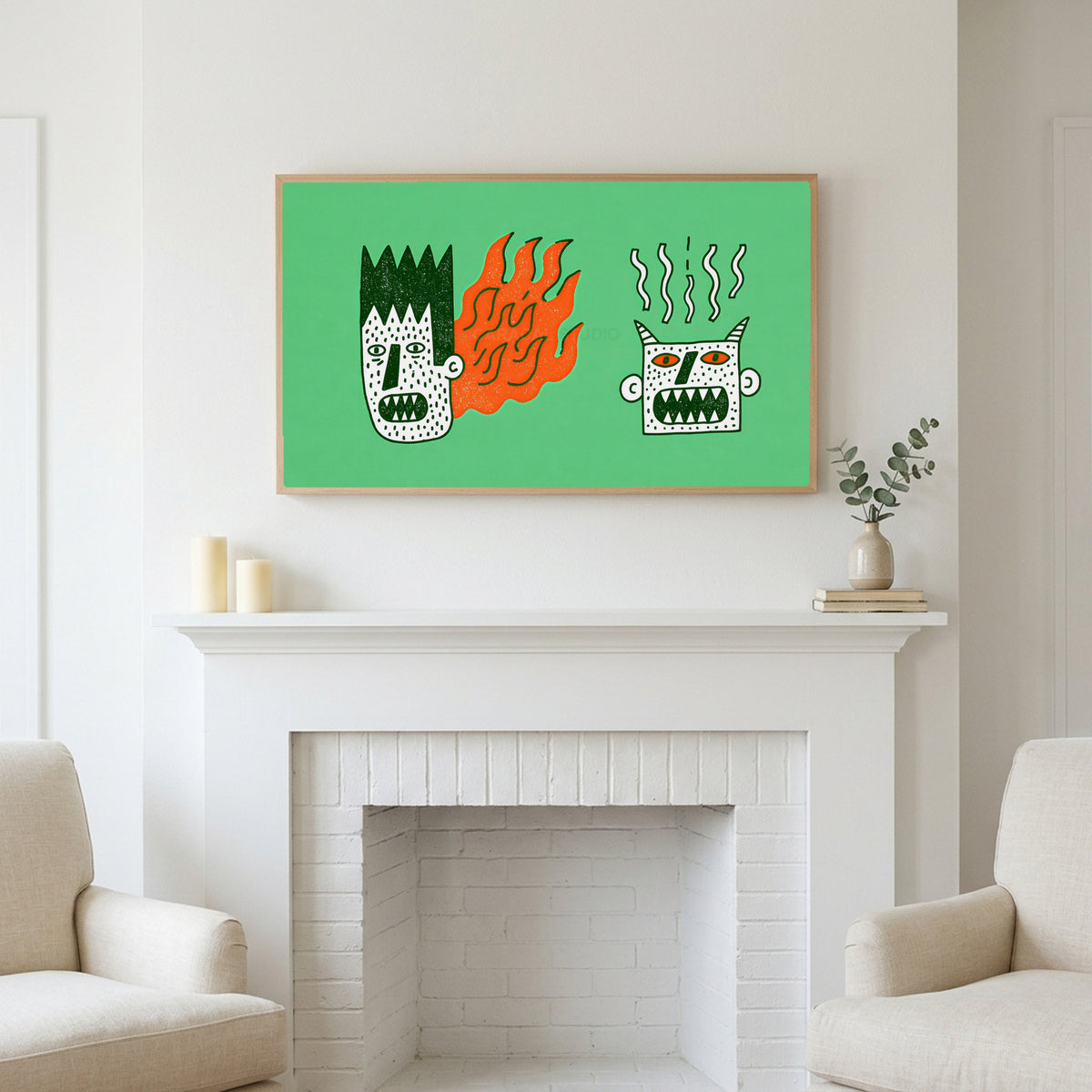 Grumpy doodle faces art above a white fireplace with candles and eucalyptus on the mantel