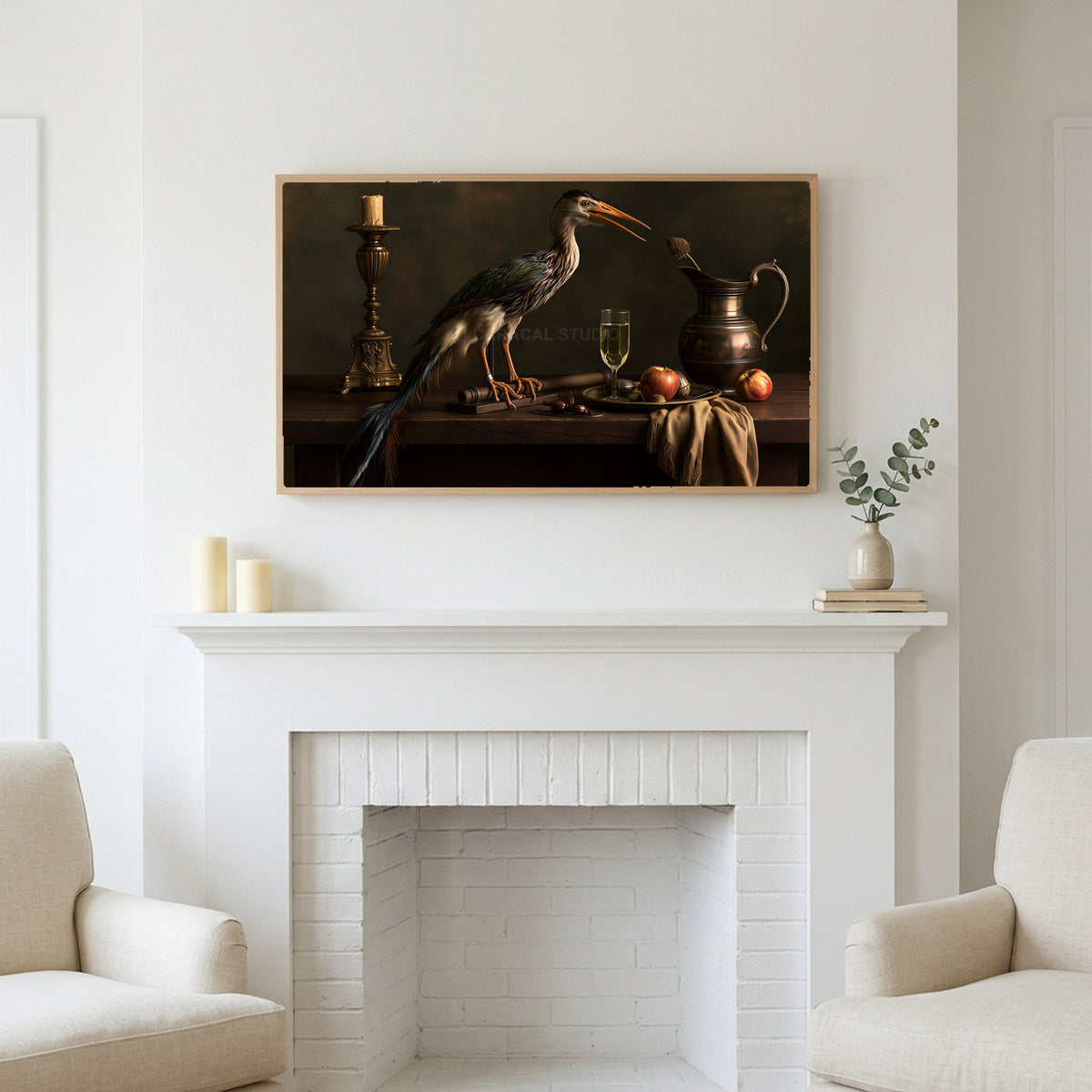 Heron still life art above a white fireplace with candles and eucalyptus on the mantel