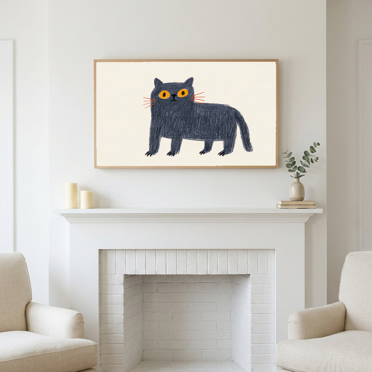 British Blue cat art above a white fireplace with candles and eucalyptus on the mantel