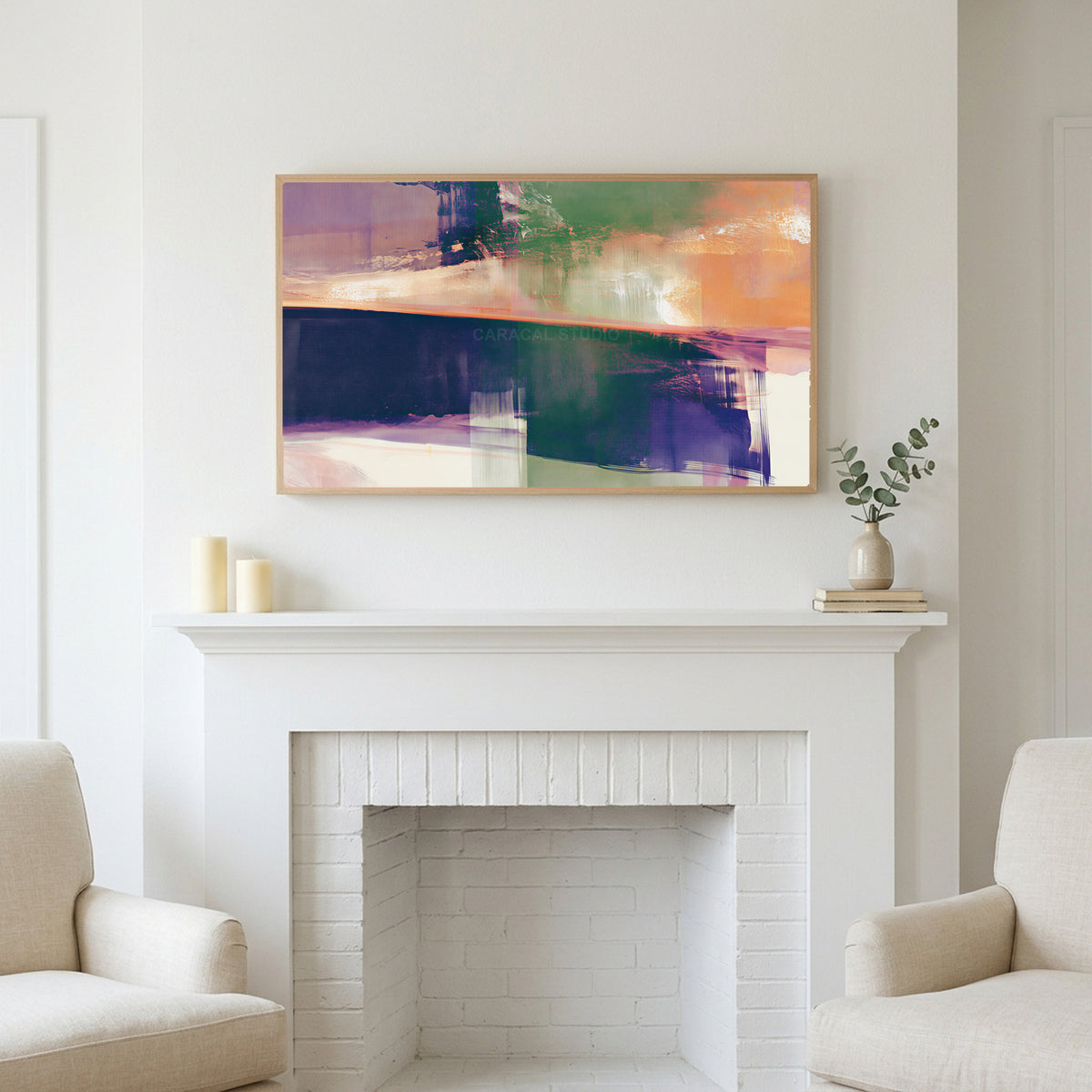 Abstract brushstroke art above a white fireplace with candles and eucalyptus on the mantel