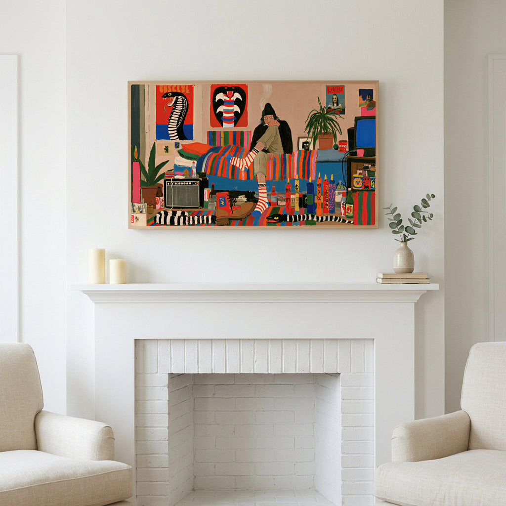 Frame TV art above a white fireplace with candles and eucalyptus on the mantel
