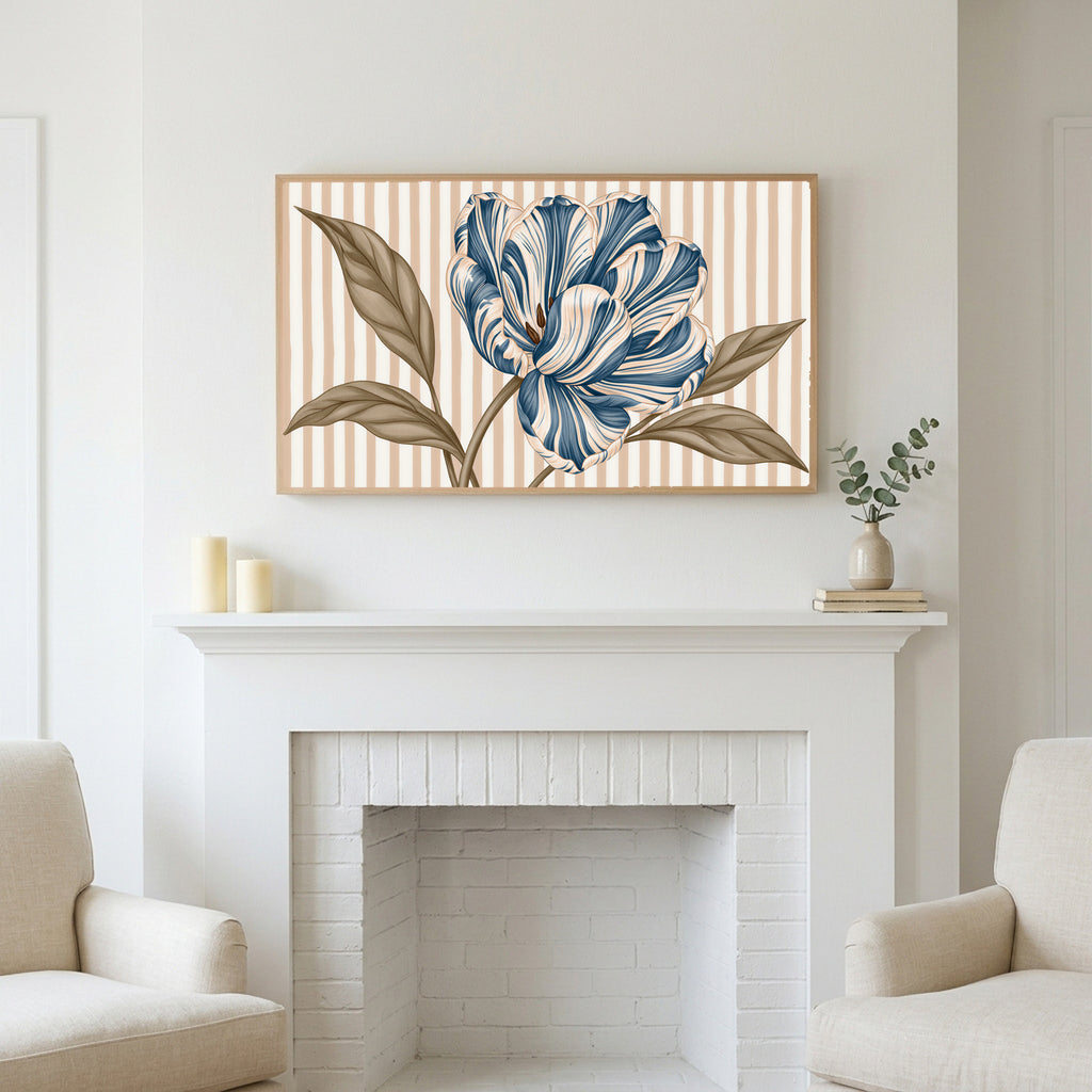 Striped tulip art above a white fireplace with candles and eucalyptus on the mantel