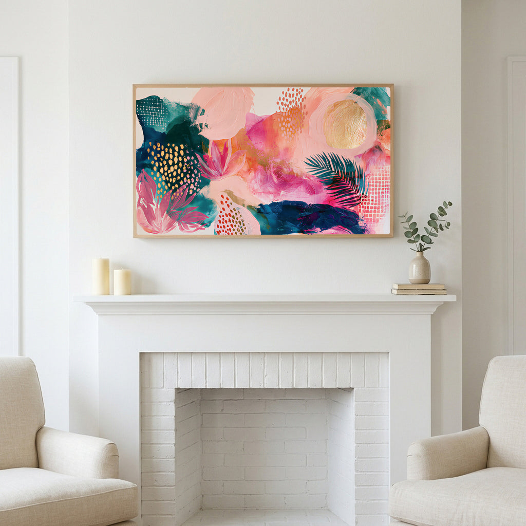 Tropical abstract art above a white fireplace with candles and eucalyptus on the mantel