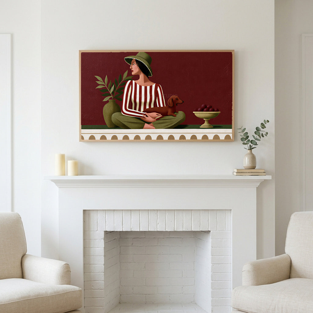 Frame TV art above a white fireplace with candles and eucalyptus on the mantel