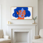 Blue hair portrait art above a white fireplace with candles and eucalyptus on the mantel