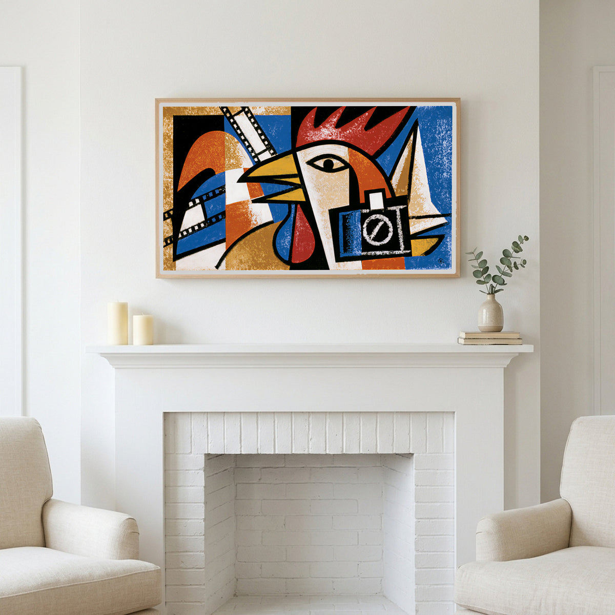 Cubist rooster art above a white fireplace with candles and eucalyptus on the mantel