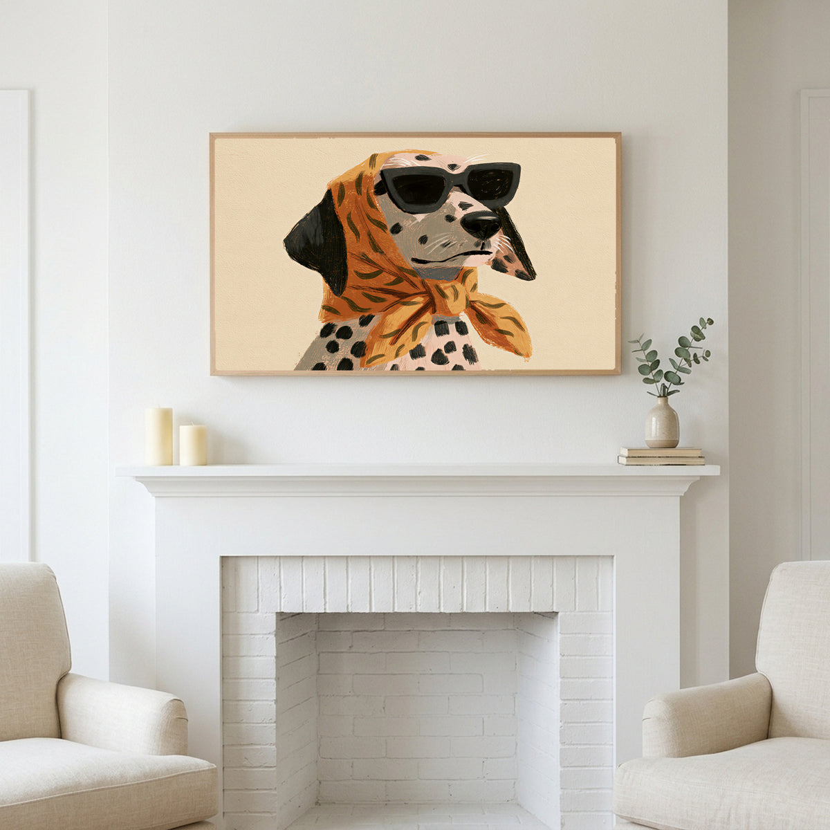 Dalmatian in sunglasses art above a white fireplace with candles and eucalyptus on the mantel