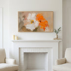Frame TV art above a white fireplace with candles and eucalyptus on the mantel