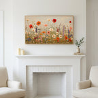 Frame TV art above a white fireplace with candles and eucalyptus on the mantel