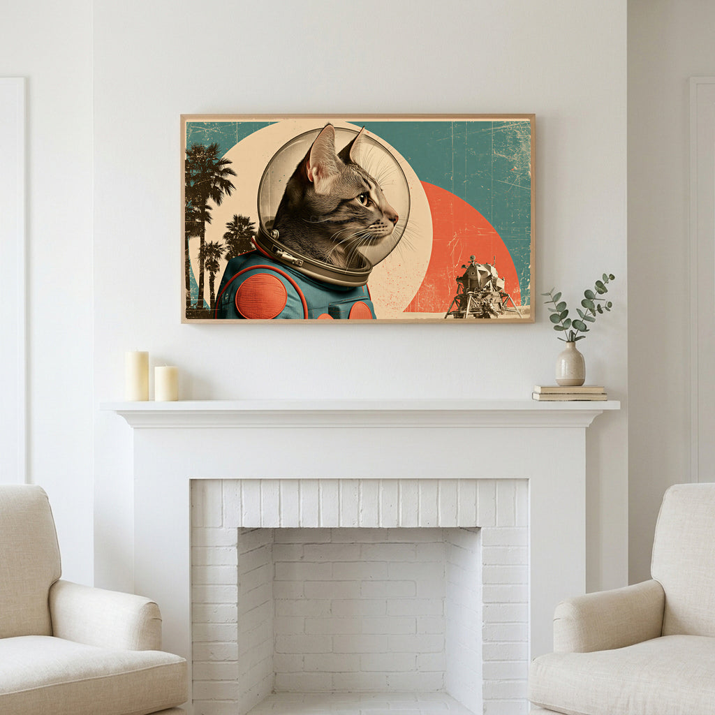 Vintage astronaut cat art above a white fireplace with candles and eucalyptus on the mantel