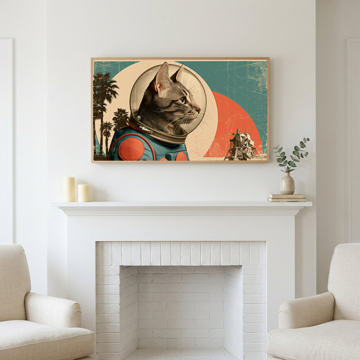Vintage astronaut cat art above a white fireplace with candles and eucalyptus on the mantel