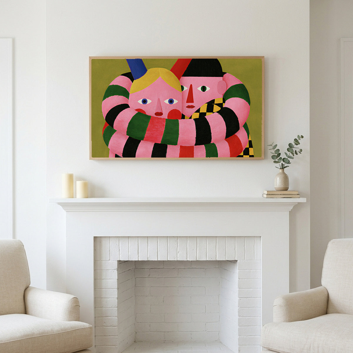Long striped arms portrait art above a white fireplace with candles and eucalyptus on the mantel