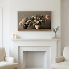 Roses and hydrangeas still life art above a white fireplace with candles and eucalyptus on the mantel