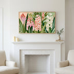 Spring hyacinths art above a white fireplace with candles and eucalyptus on the mantel