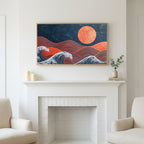 Frame TV art above a white fireplace with candles and eucalyptus on the mantel