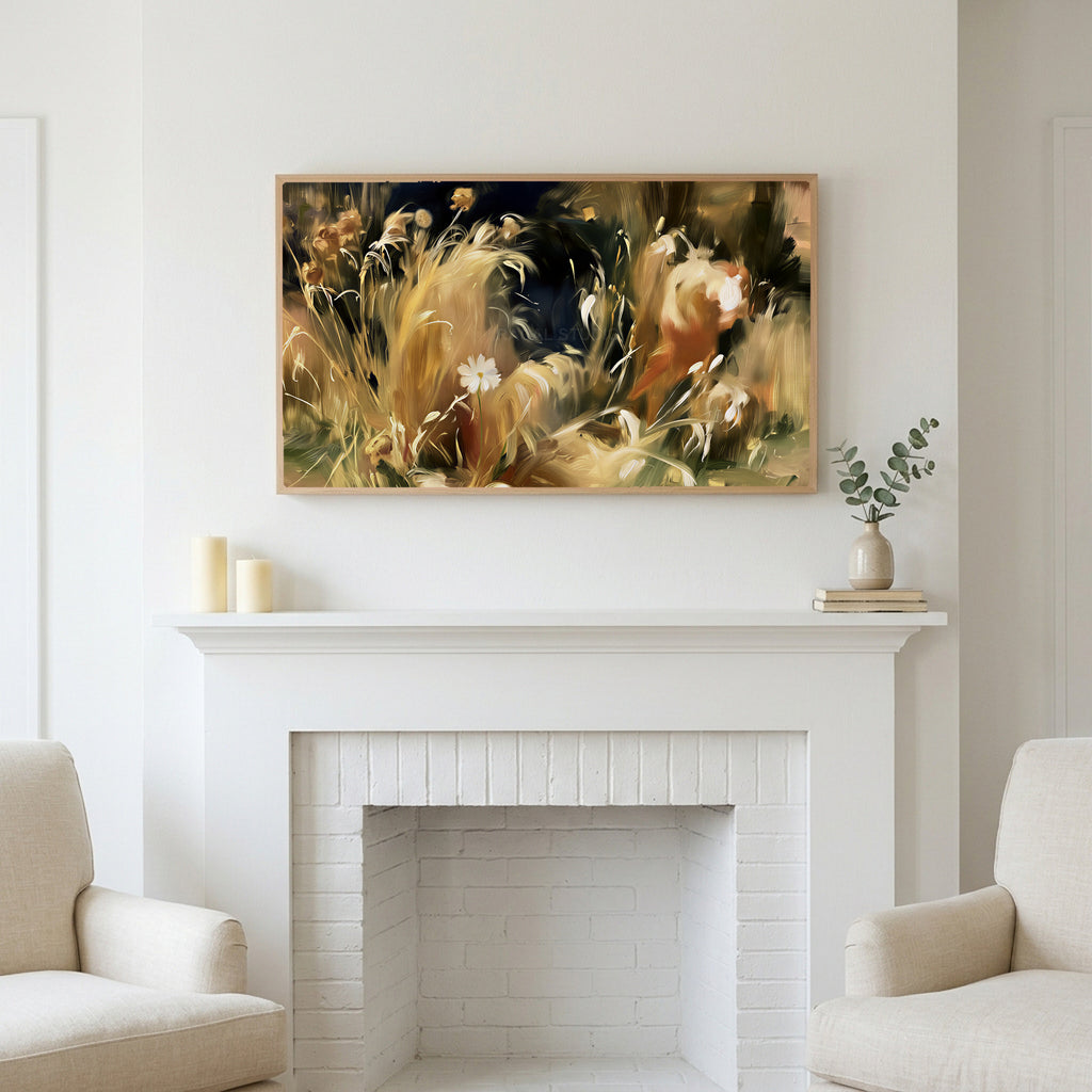 Wild grass and white flower art above a white fireplace with candles and eucalyptus on the mantel
