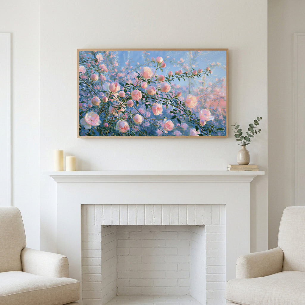 Pink spring flower buds art above a white fireplace with candles and eucalyptus on the mantel