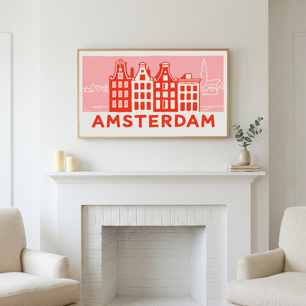 Amsterdam canal houses art above a white fireplace with candles and eucalyptus on the mantel