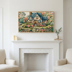 Frame TV art above a white fireplace with candles and eucalyptus on the mantel