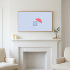 Umbrella kitten art above a white fireplace with candles and eucalyptus on the mantel