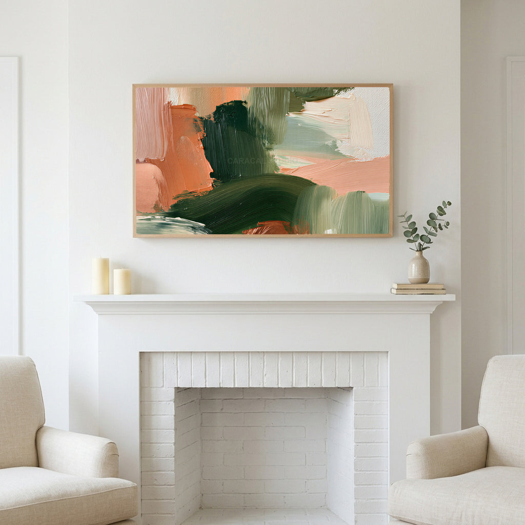 Green and peach abstract art above a white fireplace with candles and eucalyptus on the mantel