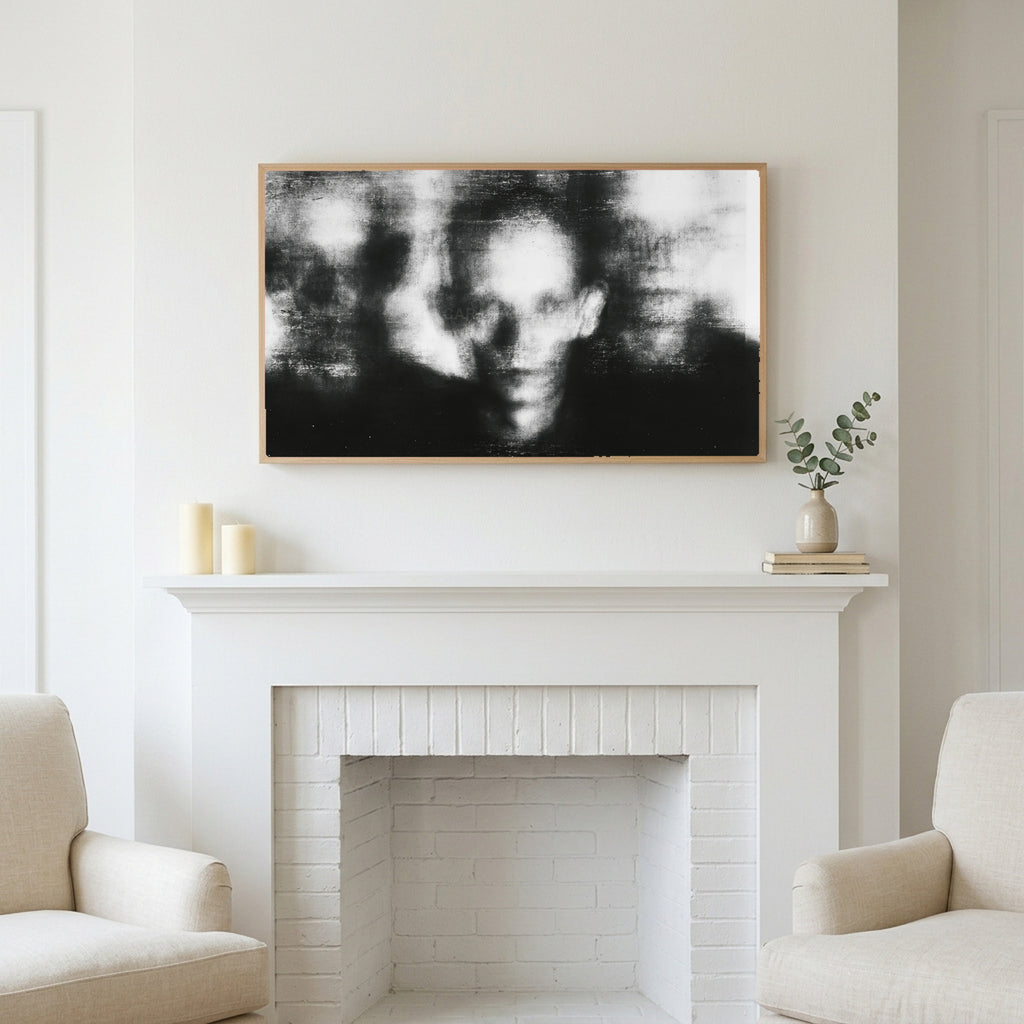 Blurred faces art above a white fireplace with candles and eucalyptus on the mantel