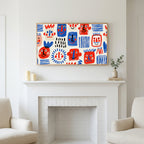 Frame TV art above a white fireplace with candles and eucalyptus on the mantel
