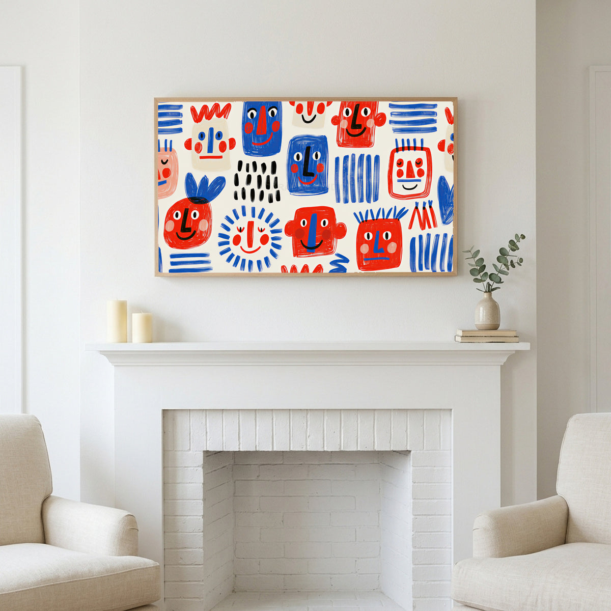 Frame TV art above a white fireplace with candles and eucalyptus on the mantel