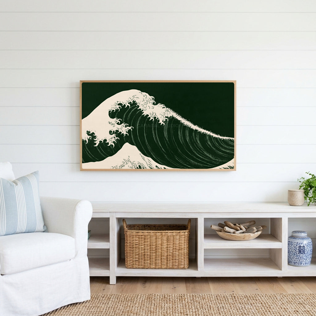 Japanese wave Frame TV art above a white console with a rattan basket in a coastal living room