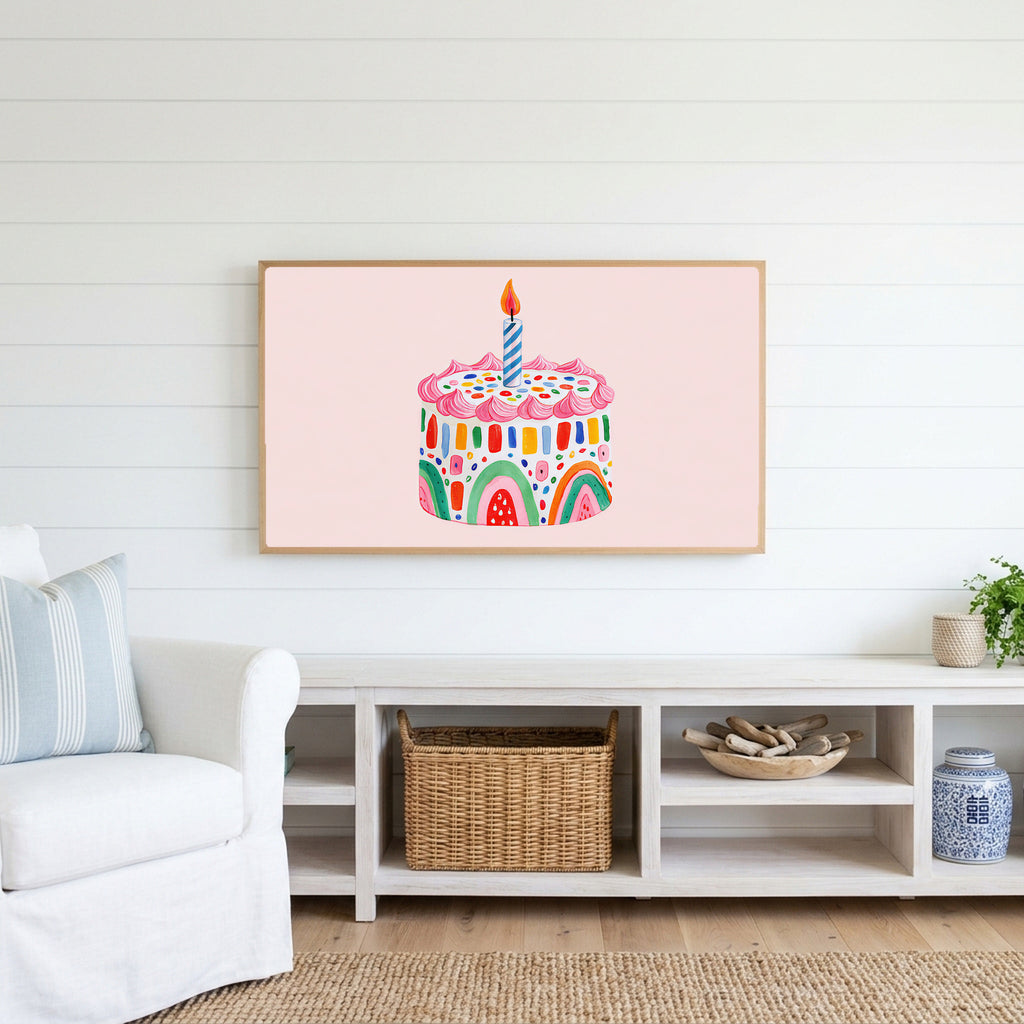 Rainbow birthday cake Frame TV art above a white console with a rattan basket in a coastal living room