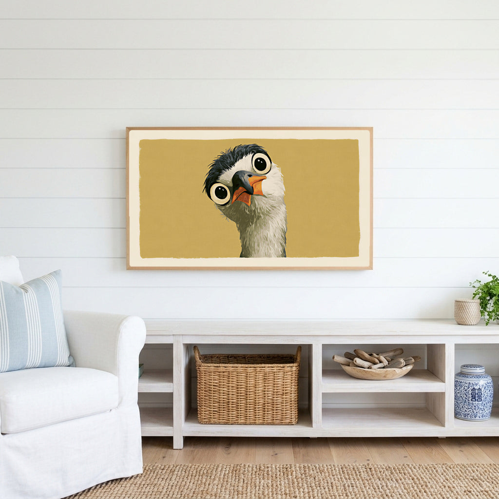 Funny heron Frame TV art above a white console with a rattan basket in a coastal living room