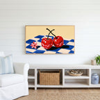 Cherry still life Frame TV art above a white console with a rattan basket in a coastal living room