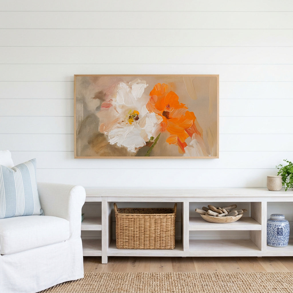 Poppy Frame TV art above a white console with a rattan basket in a coastal living room