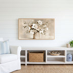 White hellebores Frame TV art above a white console with a rattan basket in a coastal living room