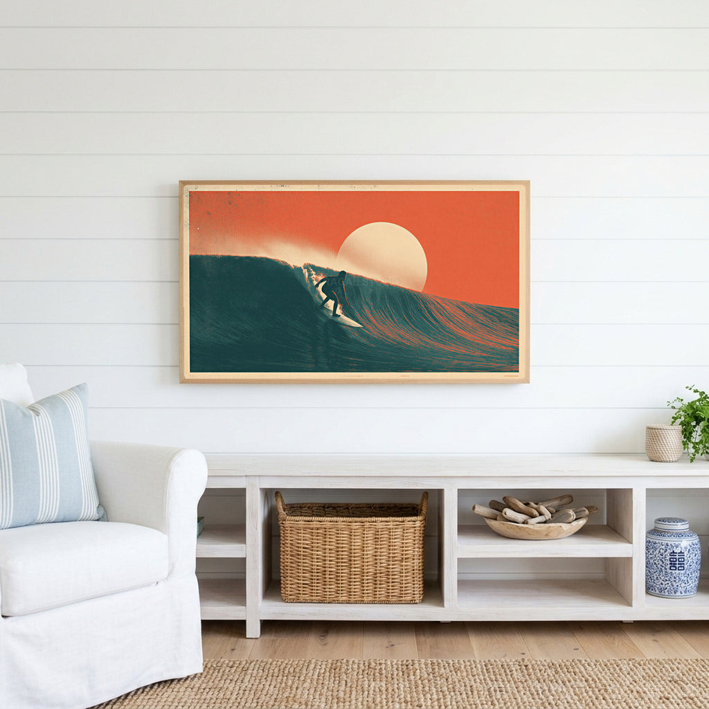 Surfer on a wave Frame TV art above a white console with a rattan basket in a coastal living room