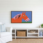 Naive horse Frame TV art above a white console with a rattan basket in a coastal living room