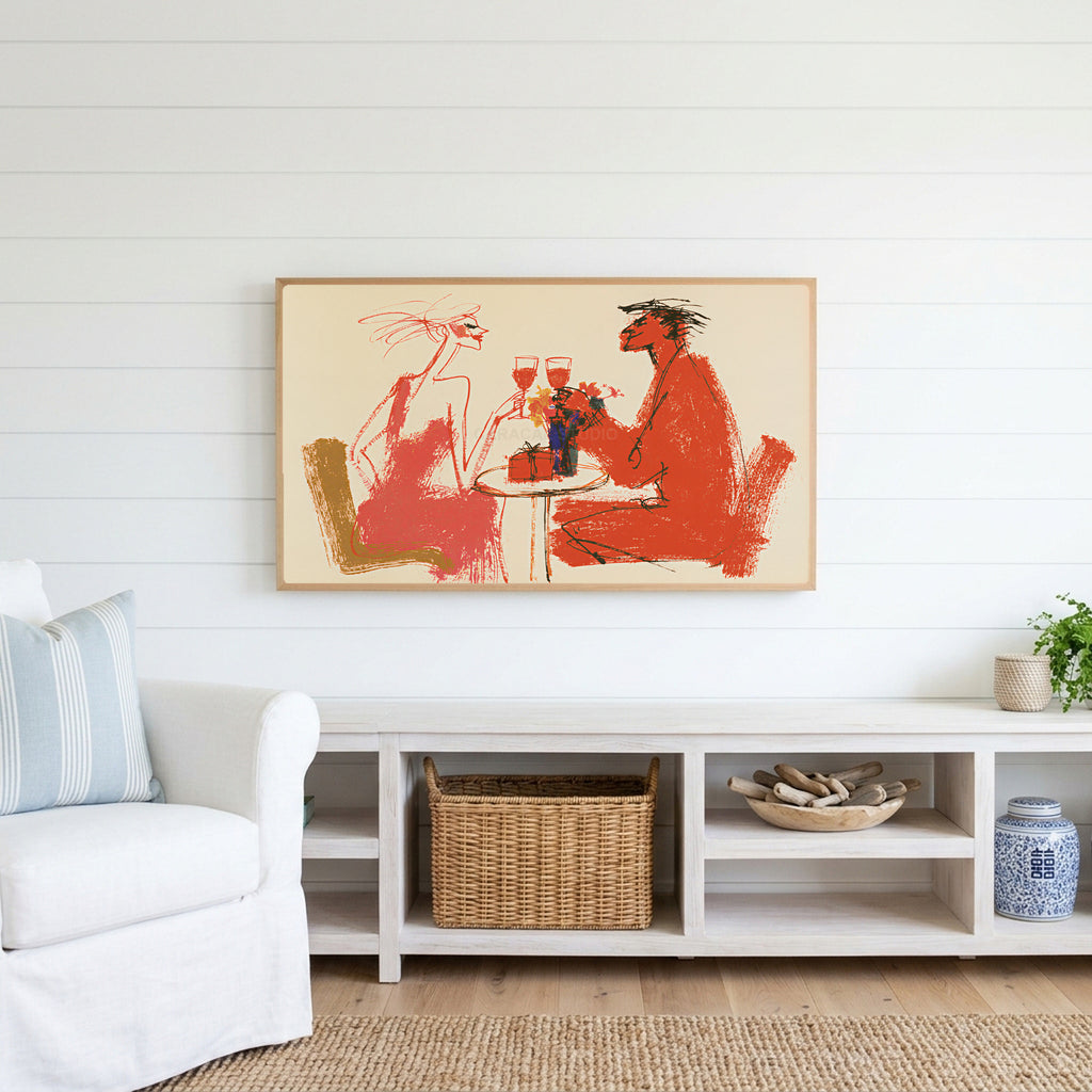 Wine toast Frame TV art above a white console with a rattan basket in a coastal living room