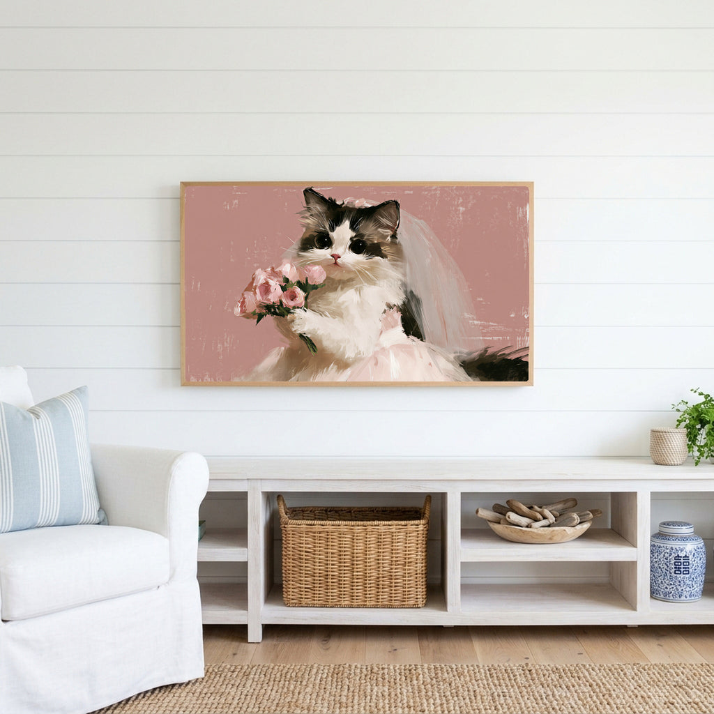 Cat bride Frame TV art above a white console with a rattan basket in a coastal living room