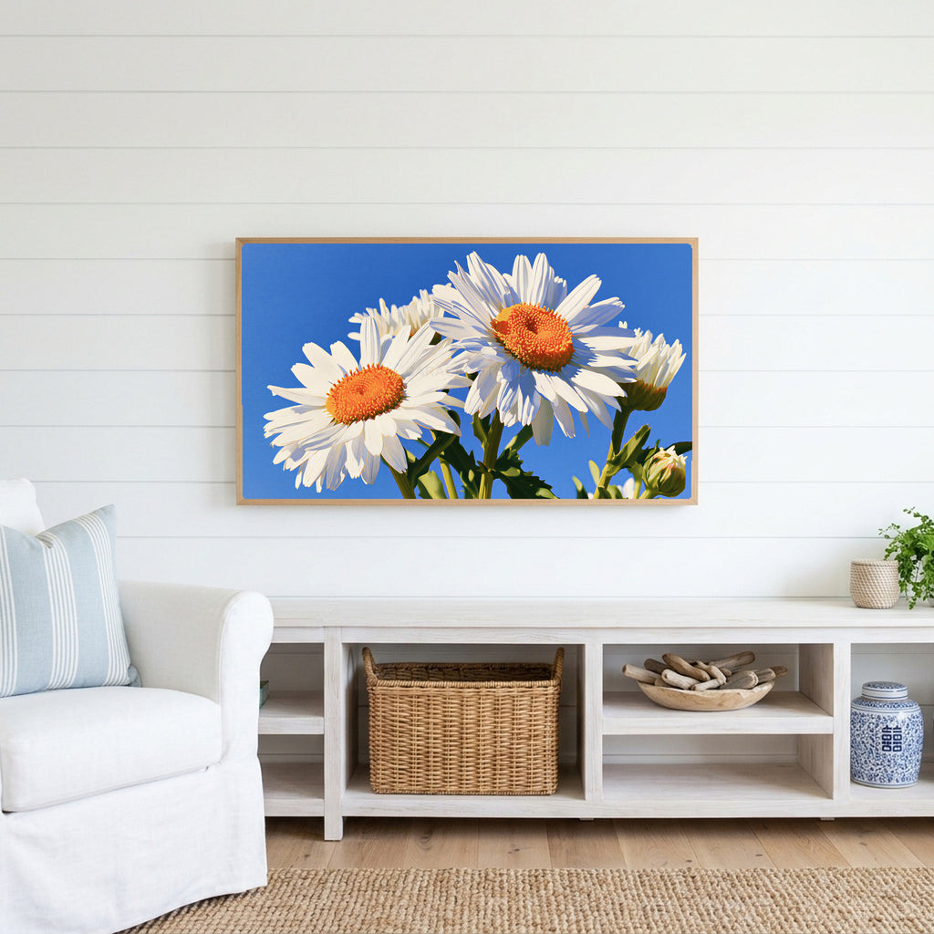 Daisy Frame TV art above a white console with a rattan basket in a coastal living room