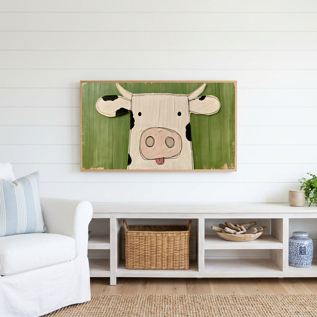 Funny cow Frame TV art above a white console with a rattan basket in a coastal living room